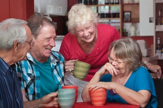 Senior citizen group meeting at a coffee shop
