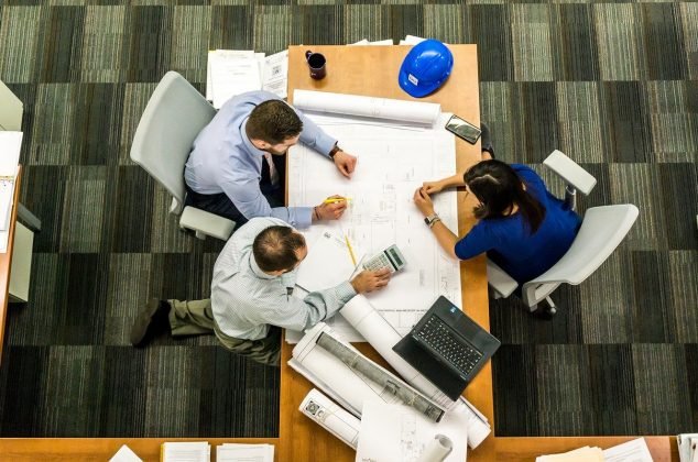Project team working at a large table