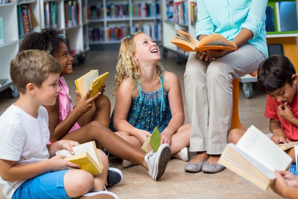Teacher and students in a guided reading group