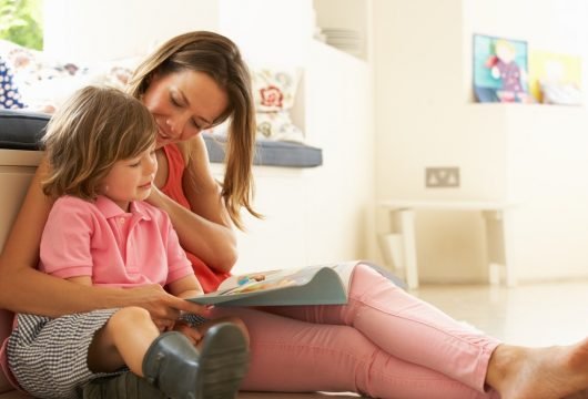 Usborne VIP group customer reading to a child